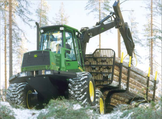 Illustration for article titled The John Deere 1110D Forwarder Laughs At Your Pickup Truck's Snow Plow